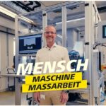 Mensch in einer Produktionsumgebung. Evva 4KS